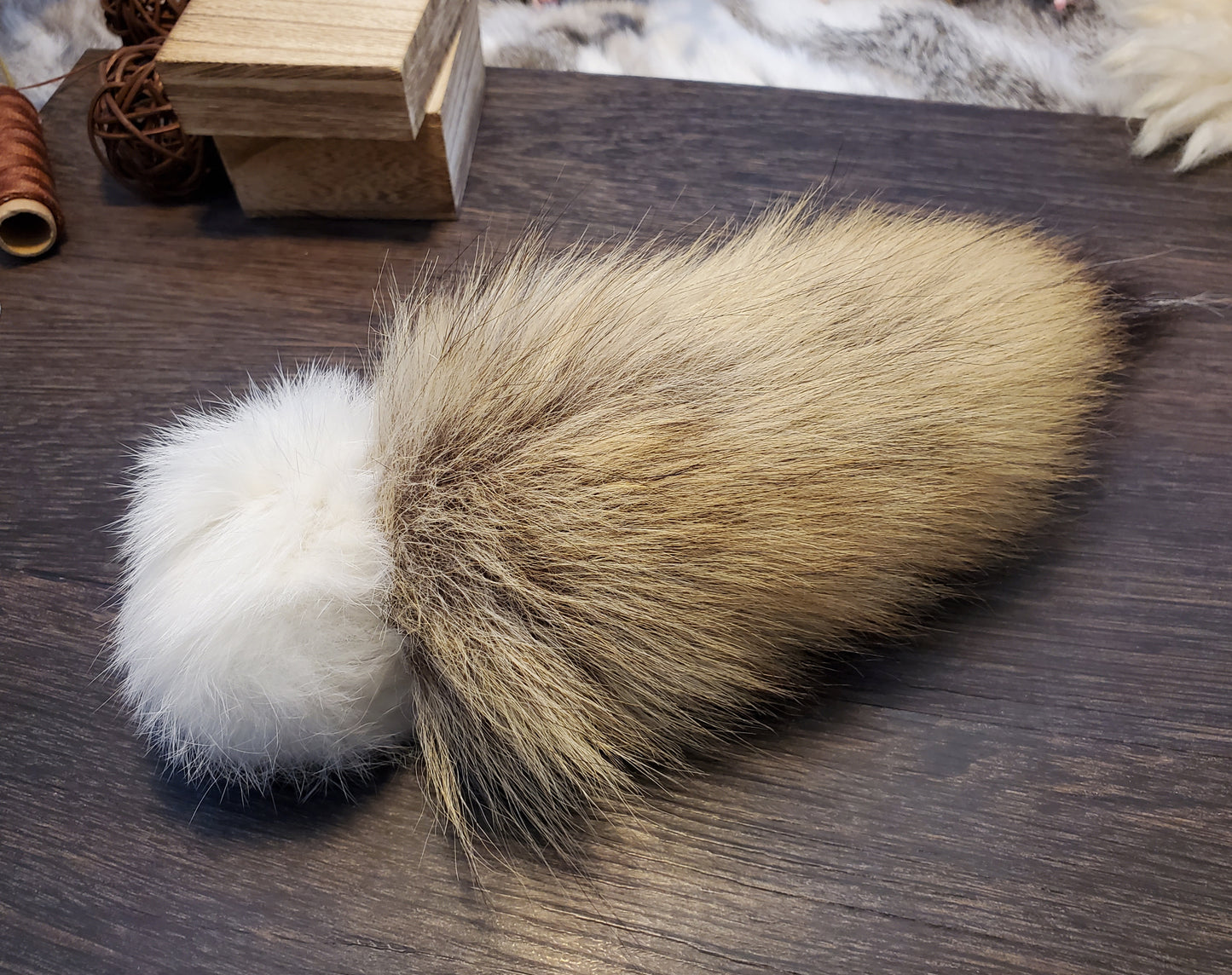 White Rabbit Fur Ball with Coyote Tail. Filled with Wool or Catnip. Handmade, all Natural, all Organic.