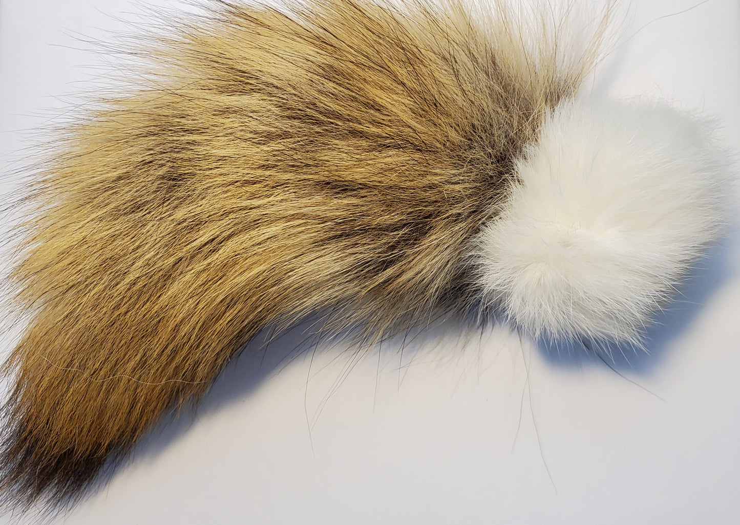 White Rabbit Fur Ball with Coyote Tail. Filled with Wool or Catnip. Handmade, all Natural, all Organic.